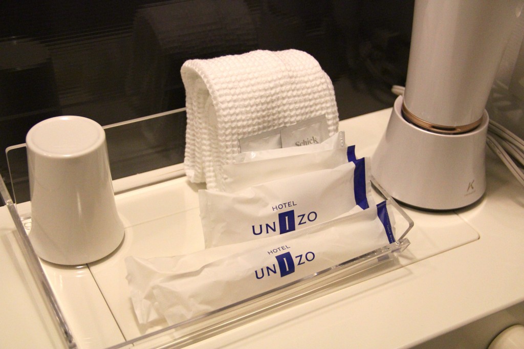 complimentary toiletry kit, body 'sponge' and hair dryer